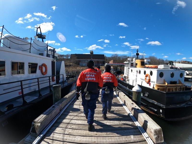 Members of BOTC 141 returning to the barracks after a day of ship handling training at the United States Coast Guard Academy.