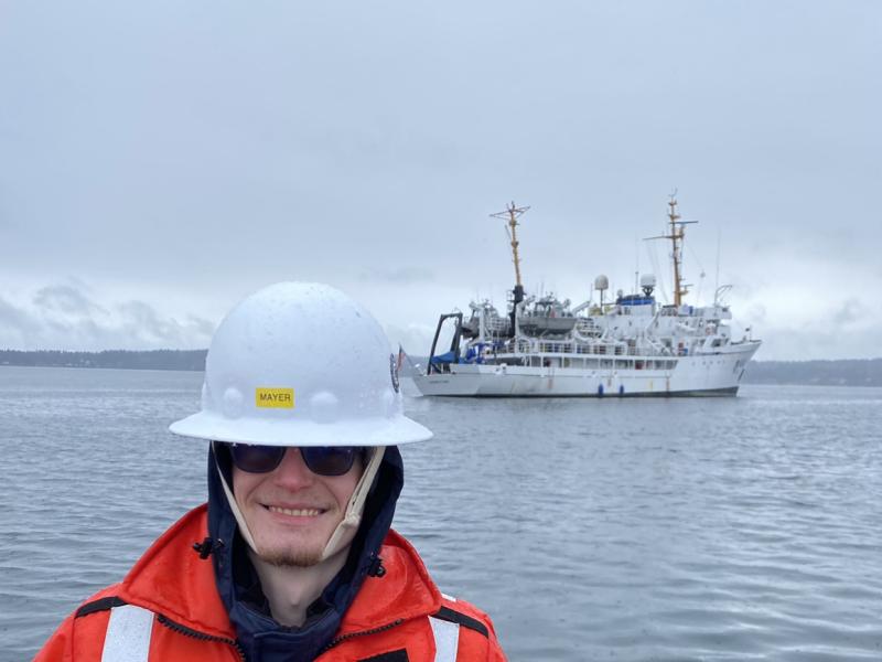 Garret Mayer with NOAA Ship Fairweather in the background. 