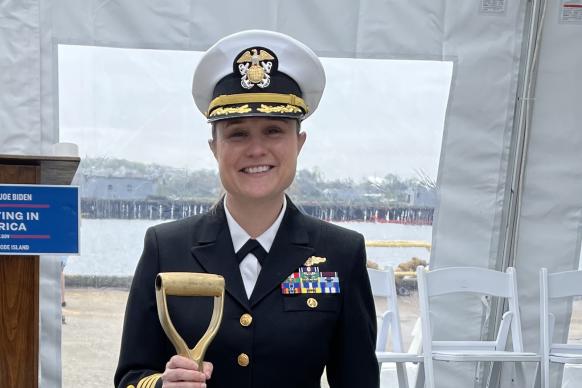 NOAA Corps Officer Amanda Goeller holding a shovel at the MOC-A groundbreaking.