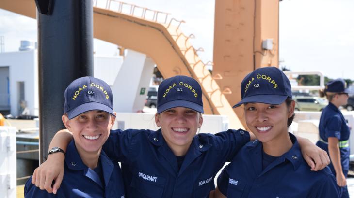 Three female NOAA Corps officer candidates aboard a NOAA ship