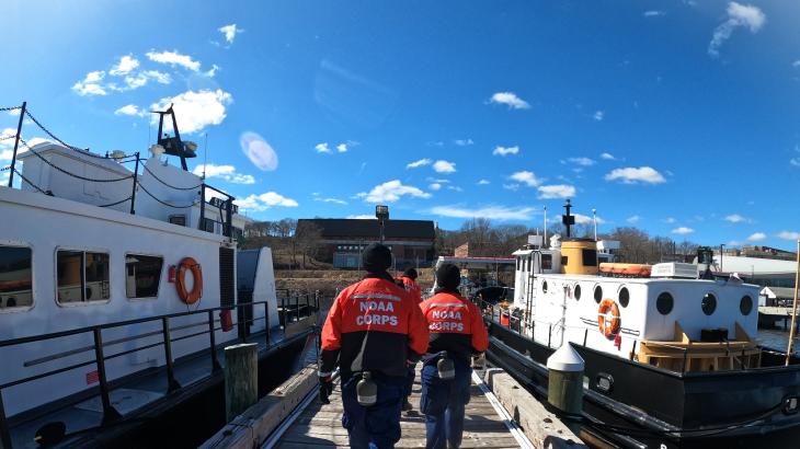 Members of BOTC 141 returning to the barracks after a day of ship handling training at the United States Coast Guard Academy.