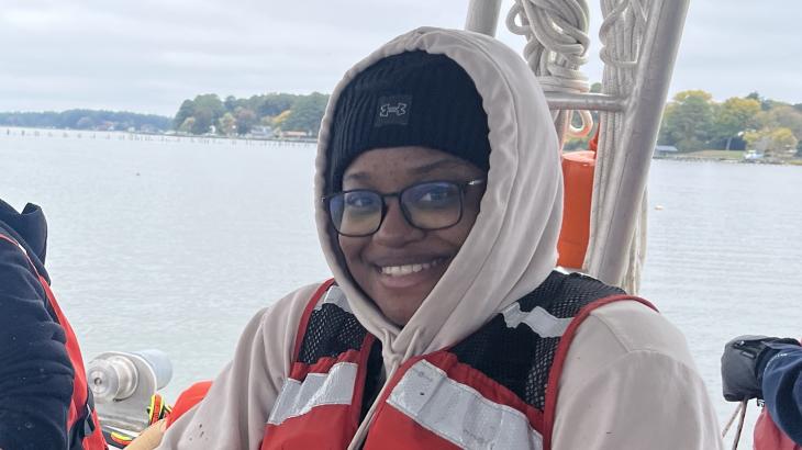 A woman on the deck of a ship