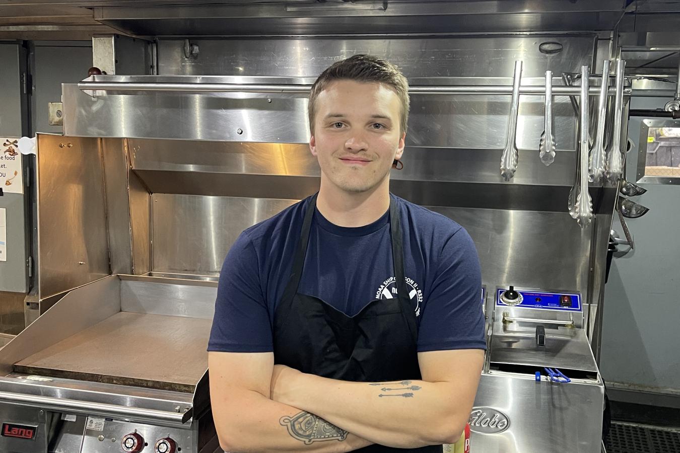 Bailey Glessner in the galley of NOAA Ship Oregon II