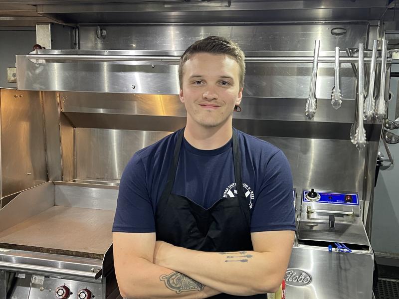 Bailey Glessner in the galley of NOAA Ship Oregon II