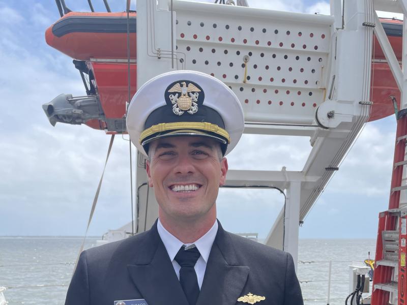 LCDR Dustin Picard standing on the deck of NOAA Ship Nancy Foster