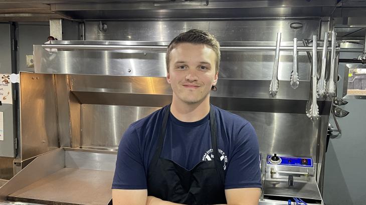 Bailey Glessner in the galley of NOAA Ship Oregon II