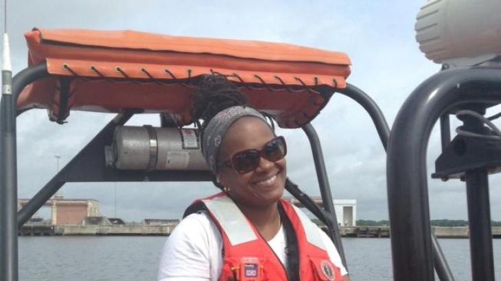 A NOAA boatswain on a small boat.