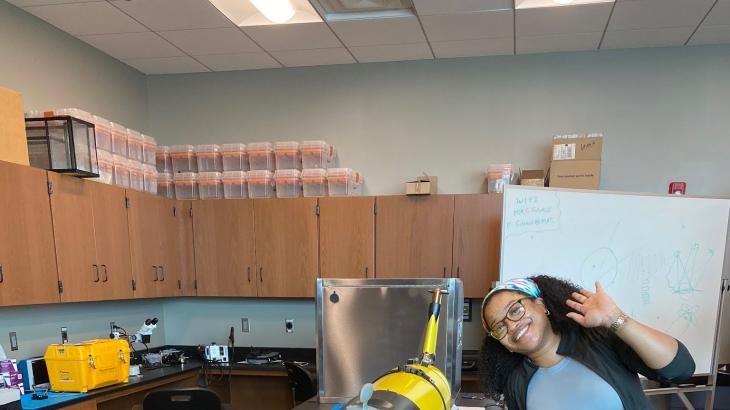 OMAO Knauss Fellow, Chesna Cox, with a yellow underwater buoyancy glider.