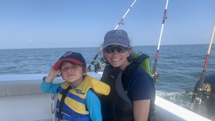 Alexis Gutierrez on a boat with her son. Credit: Alexis Gutierrez. 