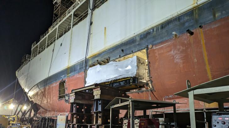 New engine being loaded into a ship