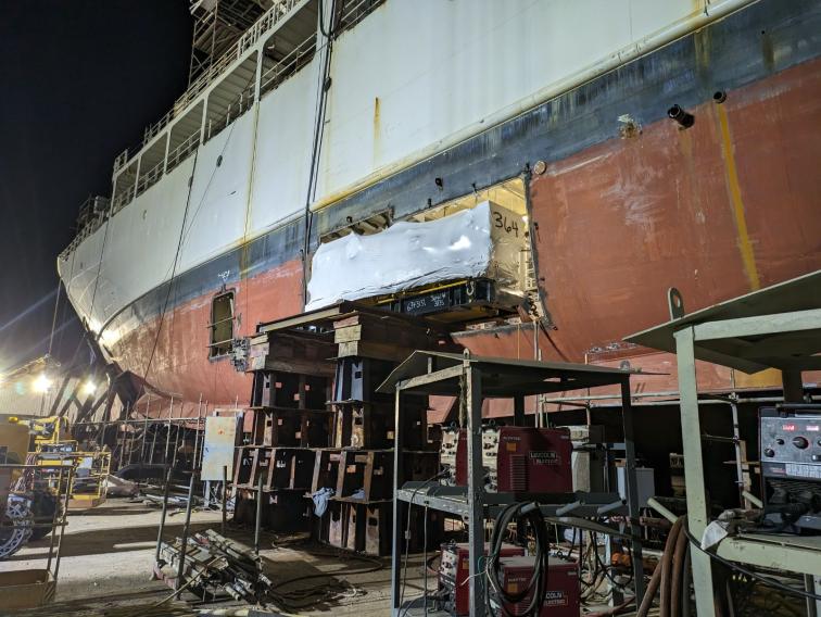 New engine being loaded into a ship